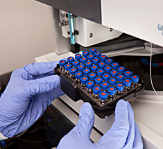 vials being tested with lab equipment