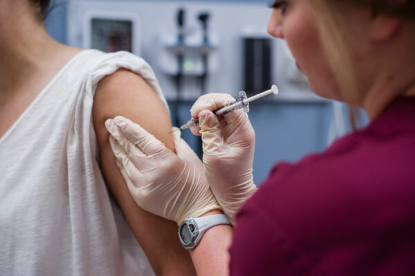 Woman Getting Flu Vaccination