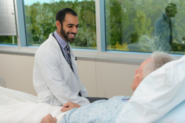 Doctor Consulting With Patient.