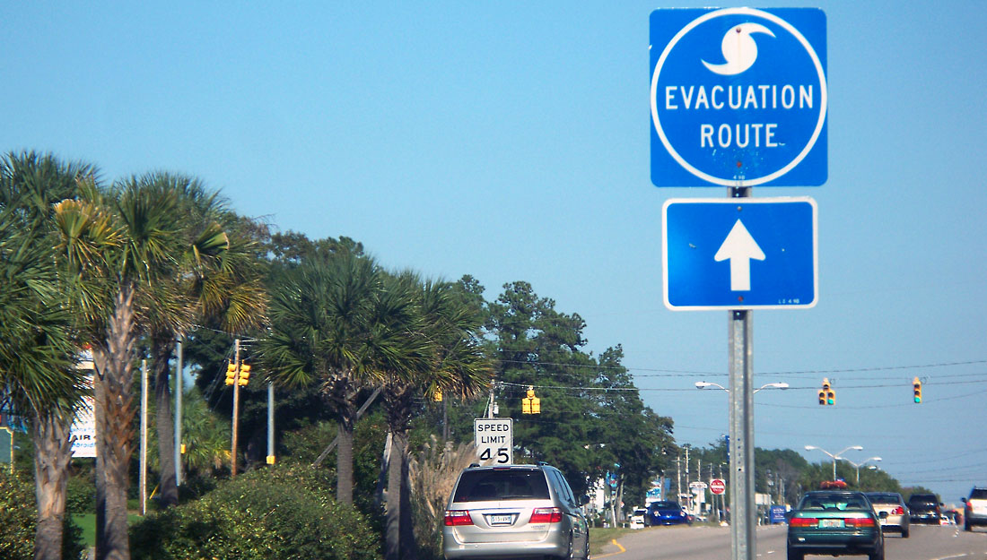 Hurricane Evacuation sign with traffic