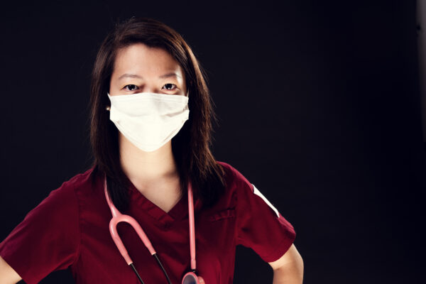 Health Care Professional In Mask