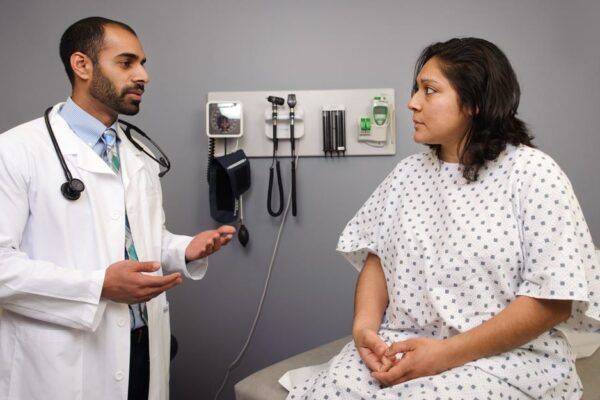 Doctor Checking Female Patient