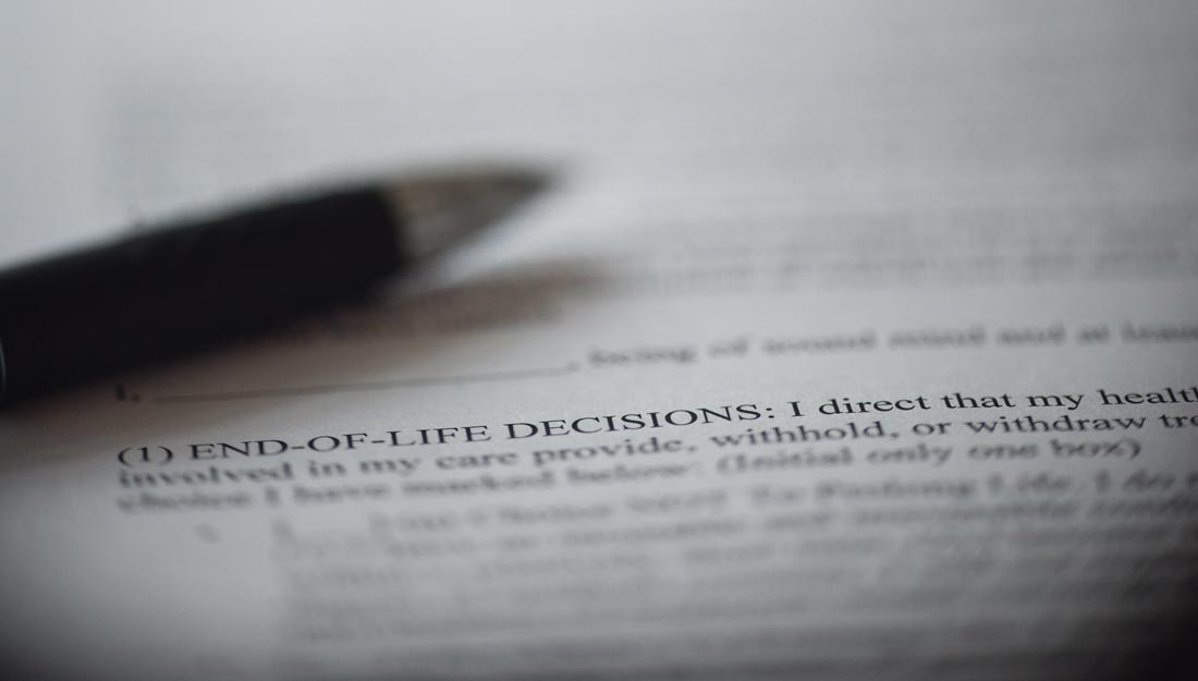 Piece of paper with a closeup on the words "End-of-Life decisions"