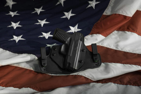 Gun On US Flag