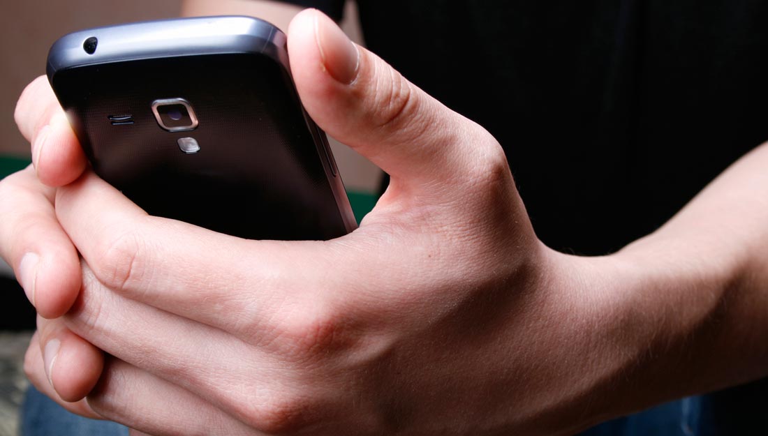 Man holding cell phone