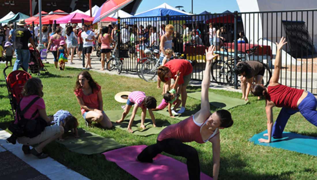 People doing yoga outside