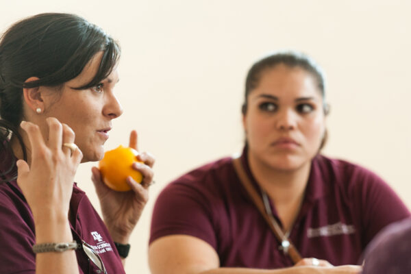 Student With Orange