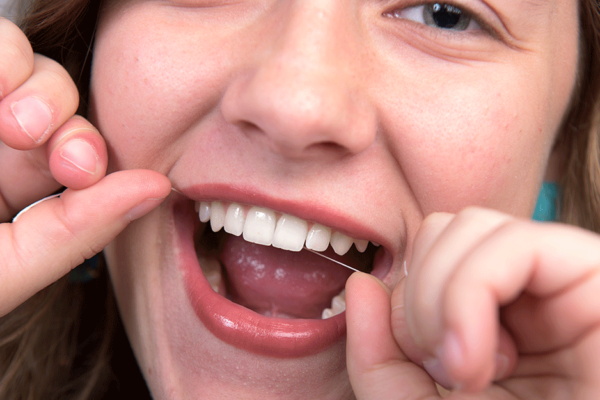 Female Flossing