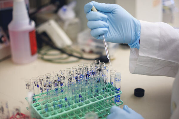 Researcher Working With Test Tubes