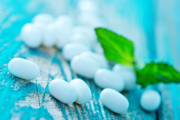 Mint Candies And Mint Leaves On A Table