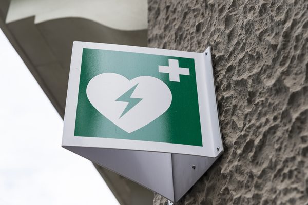 AED Automated External Defibrillator Emergency Sign Mounted On A Wall