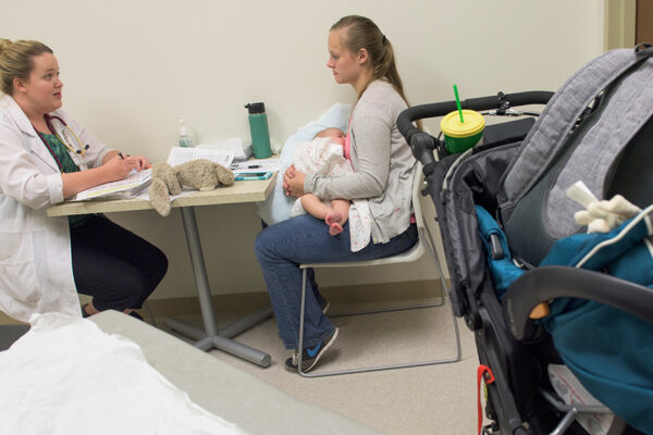 FNP Student Talking To Young Mother