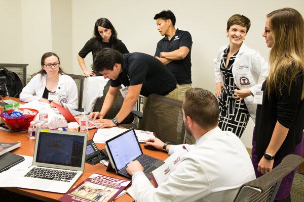 SHIFT Case Competition Student Participants Prepare Their Case At The Texas A&M College Of Medicine.