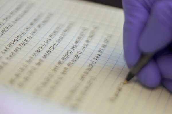 Hand Writing In Lab Notebook