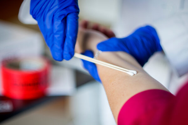 Forensic Nurse Examining Patient