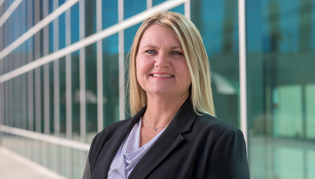 TexVet director, Carrie Sconza, smiling at the camera