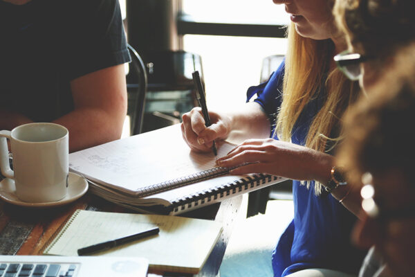 College Students Studying And Drinking Coffee