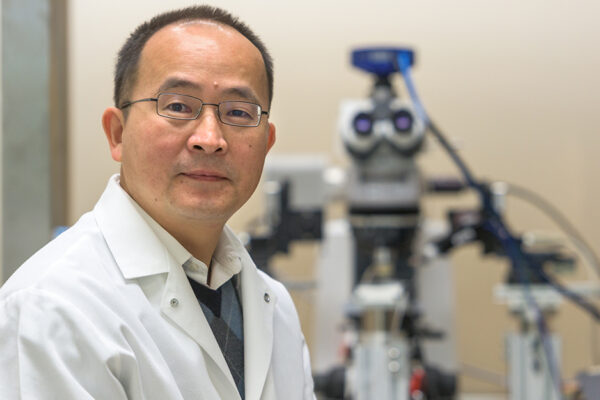 Picture Of Head Researcher, Jun Wang, MD, In His Laboratory