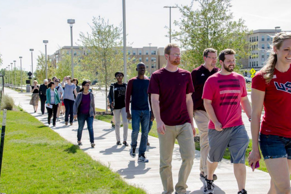 Students And Faculty Walk Around Their Building To Manage Stress