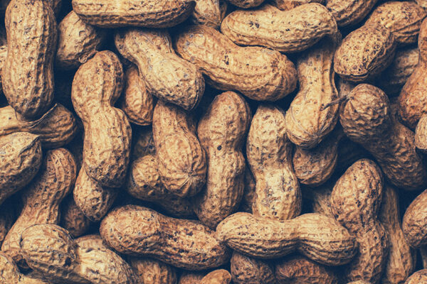 Food Allergy: Signs And Types. The Image Is A Pile Of Peanuts.