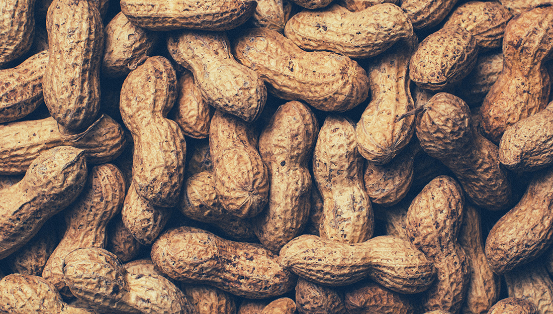 Food allergy: Signs and types. The image is a pile of peanuts.