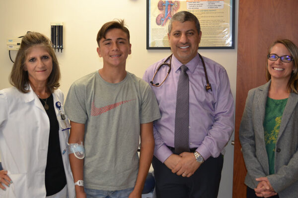 From Left: Janette Judd, RN, GIHH Clinical Research Nurse; Clinical Trial Patient Asher Springs; Samhar Al-Akash, MD, Medical Director, Driscoll Children’s Kidney Center And Renal Transplantation; Erin Richmond, RN, GIHH Program Manager