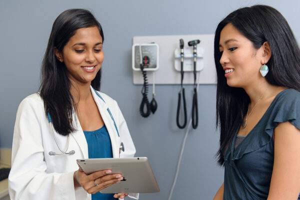 A Doctor Speaking To Her Patient