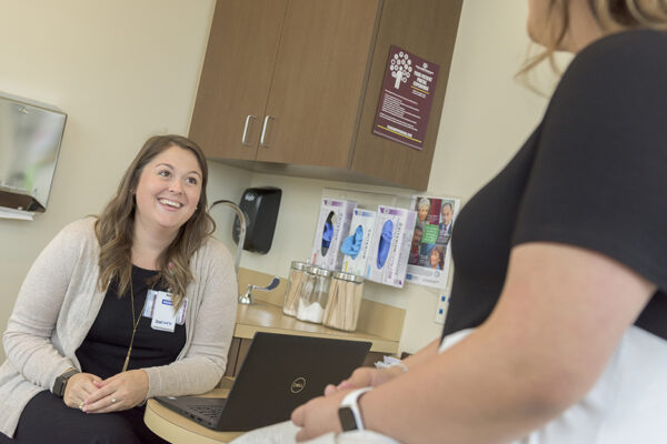 Doctor Speaking To Her Patient