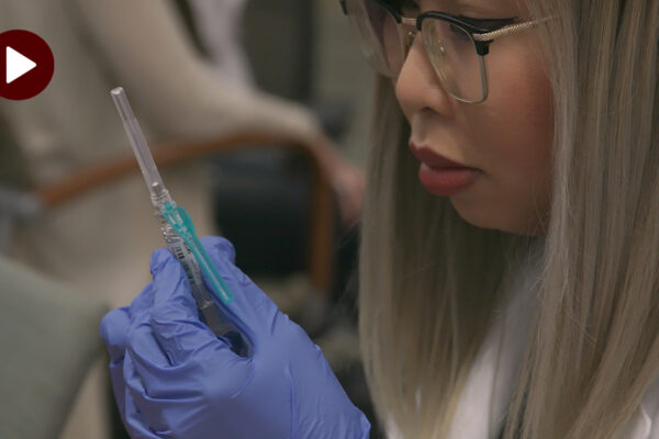 Medical Professional Preparing A Flu Shot