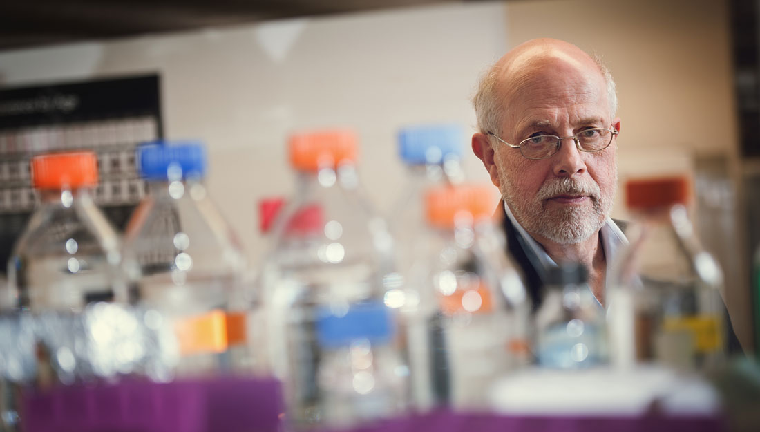 Magnus Hook stands in a laboratory, looking directly at camera