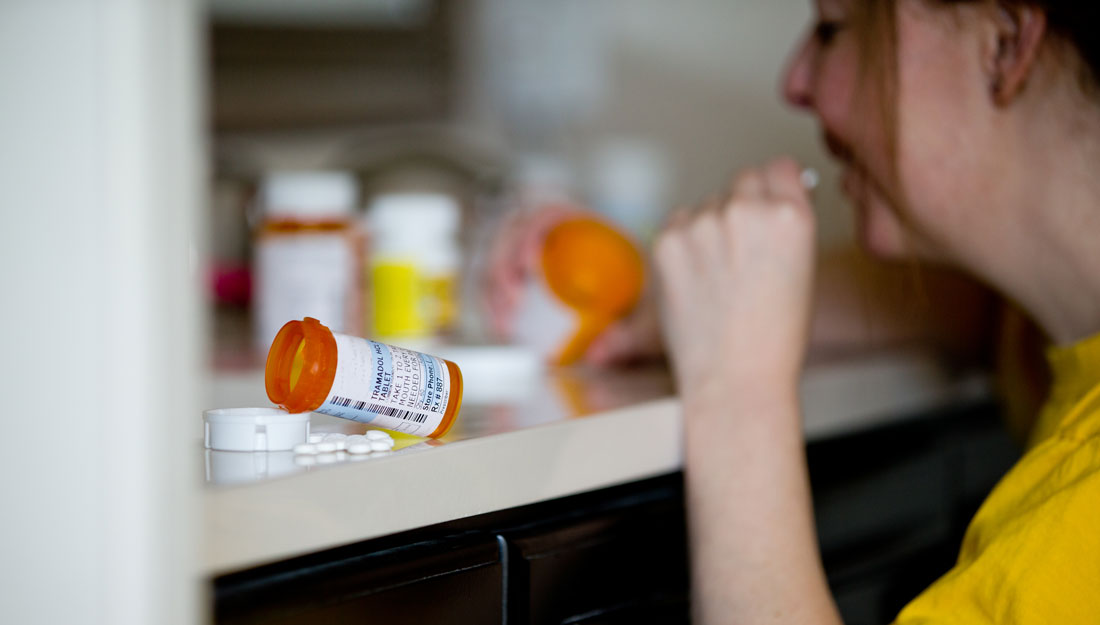 bottle of opioids open on a counter