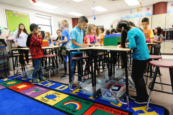 Elementary School Children Work In A Classroom