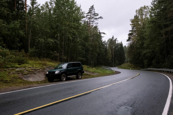 SUV Parked On Highway Roadside