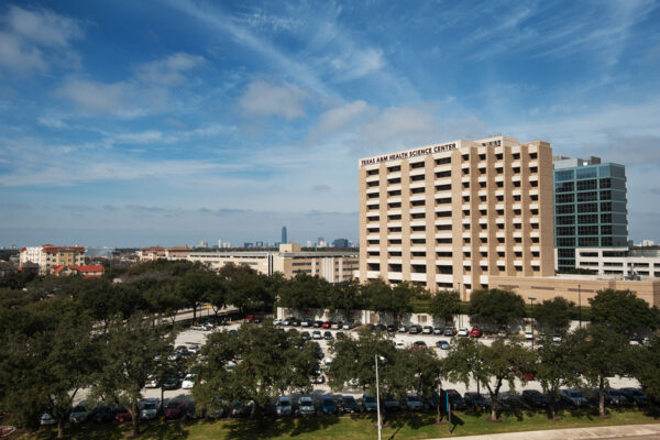 Skyline View Of The Texas A&M Alkek Building In Houston, TX