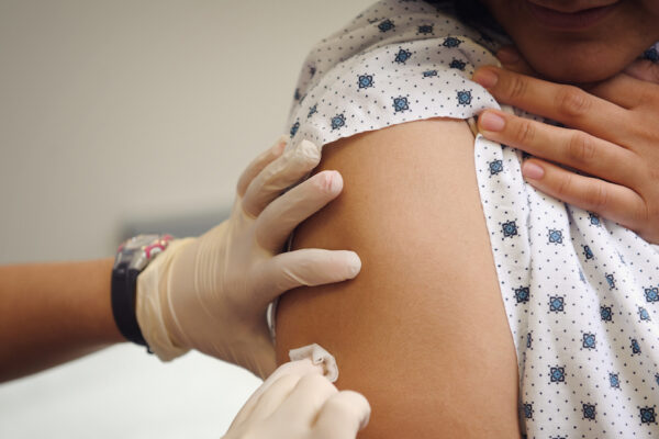 Person Preparing For A Vaccination