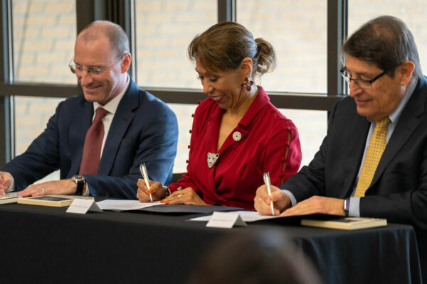 Leaders From Texas A&M Health, University Health Services And A&M-San Antonio Sign Documents At A Cermony