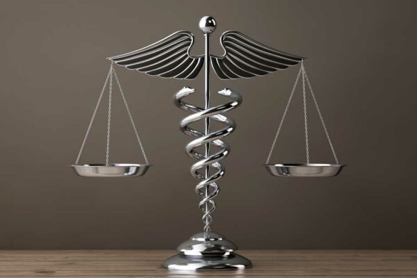 Silver Medical Caduceus Symbol As Scales