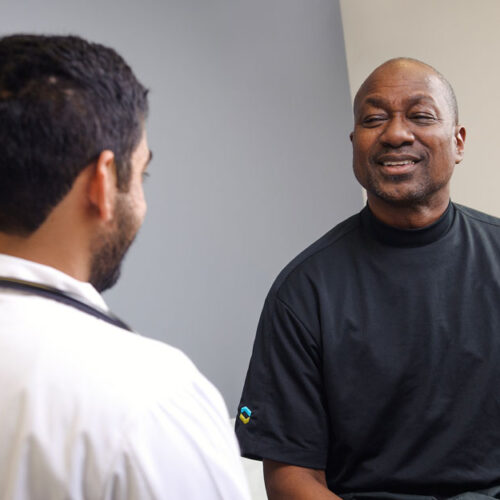 Patient Talks With Doctor