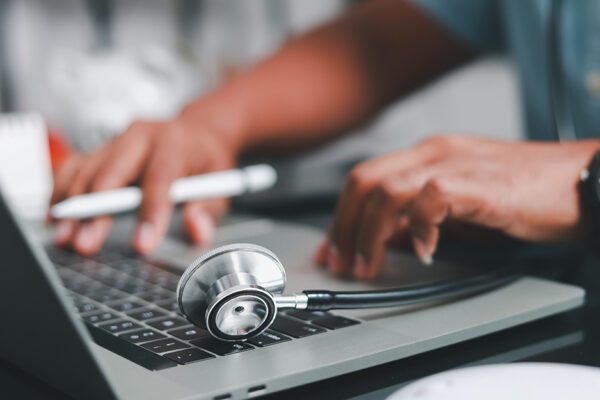 Student With Stethoscope At Laptop