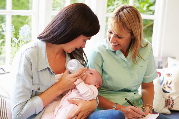 Woman With Baby And Another Woman.