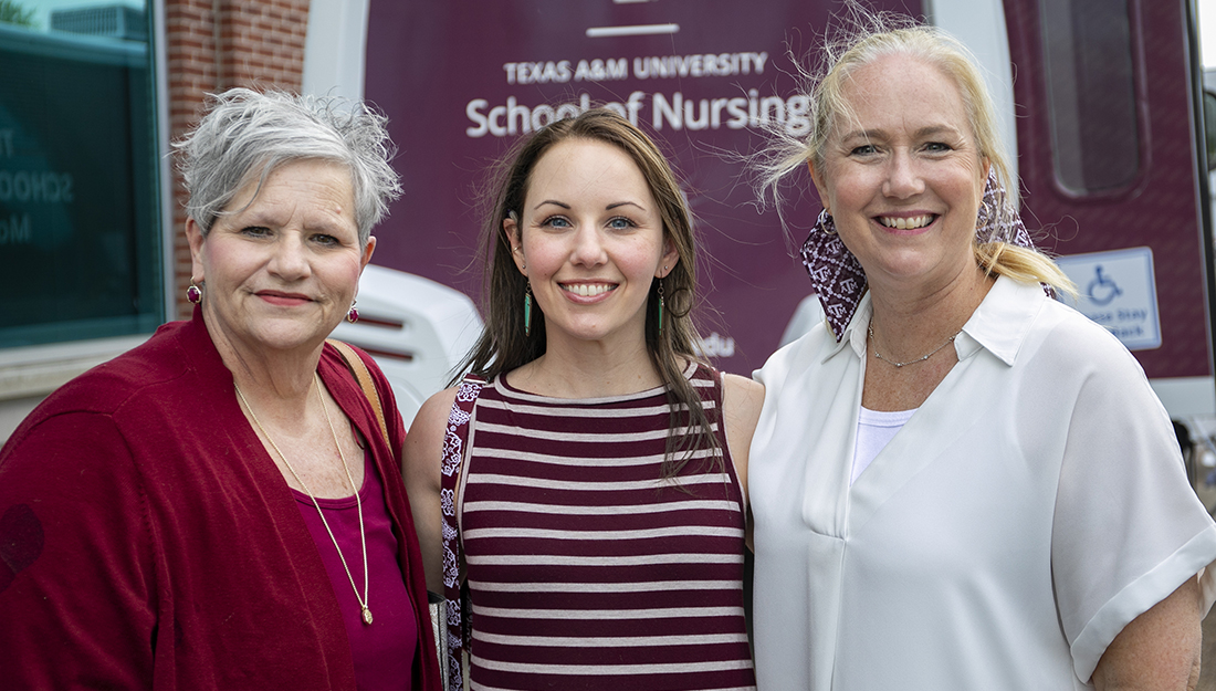 Faculty member Martha Hare, former student Annie Roberts, and School of Nursing Dean Leann Horsley