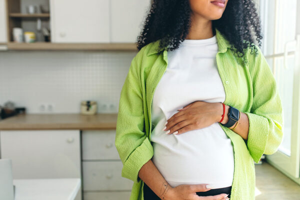 Pregnant Woman Caressing Her Stomach