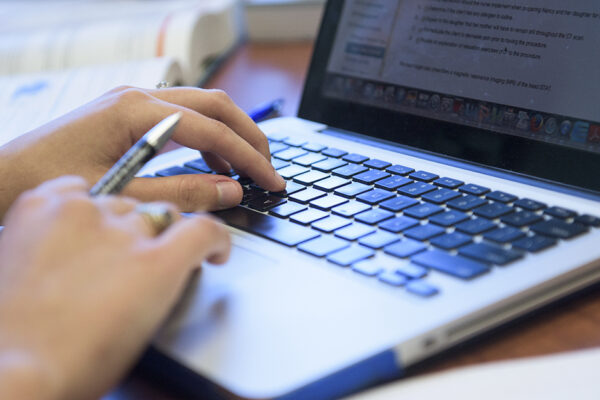 Student At Laptop